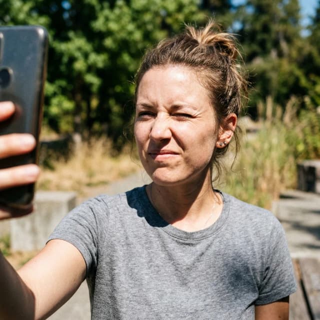 Dating profile photo before AI enhancement - casual selfie