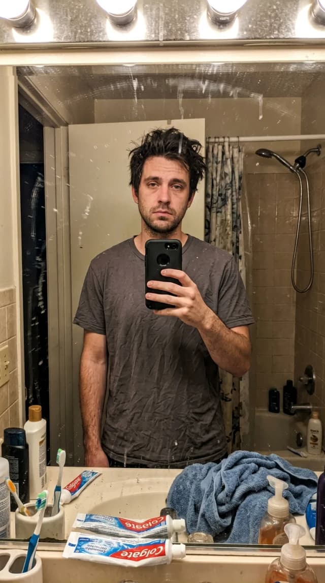 Dating profile photo before AI enhancement - casual selfie